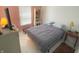 Cozy bedroom with neutral colored walls and marble tile flooring at 994 Young'S Creek Dr, Franklin, IN 46131