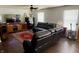Cozy living room featuring comfortable leather seating and bright, natural light at 994 Young'S Creek Dr, Franklin, IN 46131