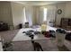 Bright bedroom with hardwood floors, large windows, and a closet at 10803 Gathering Dr, Indianapolis, IN 46259