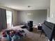 Comfortable living room with a carpeted floors and natural light at 10803 Gathering Dr, Indianapolis, IN 46259