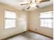 Neutral bedroom with carpet, two windows letting in lots of natural light, ceiling fan at 1101 E Loretta Dr, Indianapolis, IN 46227