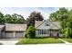 Inviting single-story home with a lush green lawn, a two car garage and well kept exterior at 1101 E Loretta Dr, Indianapolis, IN 46227