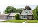 Beautiful single-story home with a well-manicured lawn, a two car garage and landscaped front at 1101 E Loretta Dr, Indianapolis, IN 46227