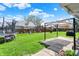 Backyard with trampoline, grill, and seating at 1111 Cambridge Dr, Greenwood, IN 46142