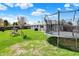 Backyard with trampoline and playset at 1111 Cambridge Dr, Greenwood, IN 46142