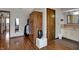 Hallway bathroom with vanity and hall closet at 1111 Cambridge Dr, Greenwood, IN 46142