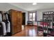 Bedroom with bunk bed, closet and wood laminate floors at 1111 Cambridge Dr, Greenwood, IN 46142