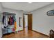 Bedroom with open closet and wood laminate floors at 1111 Cambridge Dr, Greenwood, IN 46142
