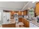 Inviting kitchen features granite countertops, ample cabinetry, and modern appliances at 1124 Enchanted View Dr, Mooresville, IN 46158