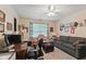 Comfortable home office with a desk, seating area, and ample natural light; perfect for remote work at 1124 Enchanted View Dr, Mooresville, IN 46158