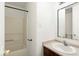 Bathroom with vanity, sink, mirror, shower and tub combo, and toilet at 11821 Wapiti Way, Noblesville, IN 46060