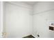 A white walk-in closet with ample storage and a single shelf at 11821 Wapiti Way, Noblesville, IN 46060