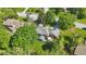 Aerial view of a well-maintained home with lush greenery, showcasing its backyard and surrounding neighborhood at 12335 Old Stone Dr, Indianapolis, IN 46236