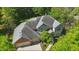 Stunning aerial view of the property showcasing its spacious layout, well-maintained roof, and landscaped surroundings at 12335 Old Stone Dr, Indianapolis, IN 46236