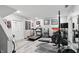 Well-equipped home gym with exercise machines, weights, and ample workout space at 12335 Old Stone Dr, Indianapolis, IN 46236