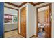 Hallway with wood flooring leading to the bathroom, living room and fireplace at 12335 Old Stone Dr, Indianapolis, IN 46236