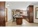 Modern kitchen features a large island with seating and stainless steel appliances at 12335 Old Stone Dr, Indianapolis, IN 46236
