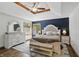 Serene main bedroom with tray ceiling, ceiling fan and a designer color palette at 12335 Old Stone Dr, Indianapolis, IN 46236