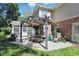 Outdoor patio with pergola, dining set, grill, and comfortable seating area at 12335 Old Stone Dr, Indianapolis, IN 46236