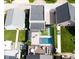 An aerial view showcasing the pool, patio, deck, and landscaped backyard of this property at 1322 Marlowe Ave, Indianapolis, IN 46202