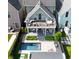 Aerial view of the property with a deck, covered patio, a pool, and a well-maintained backyard at 1322 Marlowe Ave, Indianapolis, IN 46202