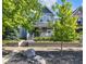 Beautiful home featuring lovely landscaping, large trees and retaining wall at 1322 Marlowe Ave, Indianapolis, IN 46202