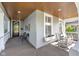 Charming front porch with rocking chairs, flower boxes and a warm, inviting atmosphere at 1322 Marlowe Ave, Indianapolis, IN 46202