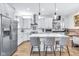 Bright kitchen with stainless steel appliances, large island, and pendant lighting at 1322 Marlowe Ave, Indianapolis, IN 46202