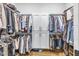 Large walk-in closet with ample storage, organized shelving, and plenty of hanging space for clothes at 1322 Marlowe Ave, Indianapolis, IN 46202