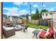 Cozy backyard with patio furniture, fire pit, and string lights, perfect for outdoor entertaining at 1333 Spann Ave, Indianapolis, IN 46203