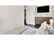 Inviting bedroom features plush bedding, natural light, and a dresser for ample storage space at 1333 Spann Ave, Indianapolis, IN 46203