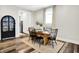 Bright dining room with a wooden table, seating for six, and modern décor at 1333 Spann Ave, Indianapolis, IN 46203