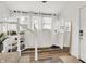 Bright entryway boasts natural light from multiple windows, complemented by stylish decor and neutral tones at 1333 Spann Ave, Indianapolis, IN 46203