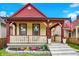 Inviting home featuring a cozy front porch and a well-kept yard at 1333 Spann Ave, Indianapolis, IN 46203