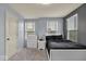 This bedroom features carpet, a light blue wall, and two large windows at 13495 Forest Glade Dr, Fishers, IN 46037