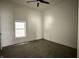 Clean and bright bedroom features modern ceiling fan at 1518 S Talbott St, Indianapolis, IN 46225