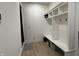 Organized mudroom with built-in cubbies and bench seating, ideal for storage and easy organization at 1518 S Talbott St, Indianapolis, IN 46225