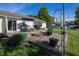 Outdoor patio area complete with dining furniture, grill, and relaxing fire pit for outdoor gatherings at 15388 Follow Dr, Noblesville, IN 46060