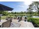 Expansive backyard with a beautiful pond view, patio area, and lush greenery, perfect for outdoor enjoyment at 15388 Follow Dr, Noblesville, IN 46060