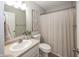 Clean bathroom featuring a white vanity, patterned shower curtain, and modern fixtures at 15388 Follow Dr, Noblesville, IN 46060