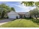 Charming single-story home featuring a well-manicured lawn, attached two-car garage, and tasteful landscaping at 15388 Follow Dr, Noblesville, IN 46060