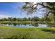 Scenic pond view from the backyard, featuring a serene water feature and lush green surroundings at 15388 Follow Dr, Noblesville, IN 46060