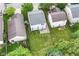 Drone shot of property showing the home, yard with firepit, and neighborhood at 15411 Wandering Way, Noblesville, IN 46060
