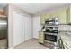 Kitchen with stainless steel appliances and granite countertops at 15411 Wandering Way, Noblesville, IN 46060