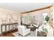 Bright living room featuring stylish furniture, wood floors, and neutral decor at 15411 Wandering Way, Noblesville, IN 46060
