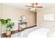 Main bedroom with neutral color scheme, hardwood floors, ceiling fan, and lots of natural light at 15411 Wandering Way, Noblesville, IN 46060