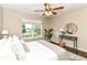 Main bedroom with neutral color scheme, hardwood floors, ceiling fan, and lots of natural light at 15411 Wandering Way, Noblesville, IN 46060