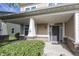 Inviting front porch with brick accents and a stylish front door, creating a warm welcome at 15710 Chapel Park E Dr, Noblesville, IN 46060