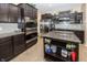 Contemporary kitchen with stainless steel appliances, granite countertops, and a functional center island at 15710 Chapel Park E Dr, Noblesville, IN 46060