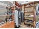 Custom closet featuring built-in drawers, racks and shelving for ample storage at 16502 Grand Cypress Dr, Noblesville, IN 46060